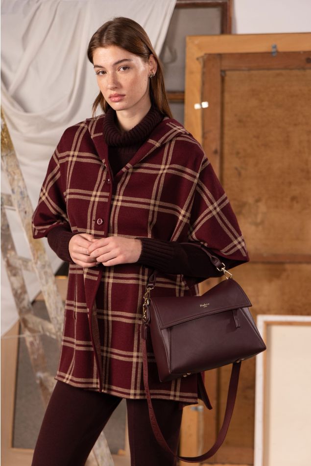 Capa de punto jacquard con capucha