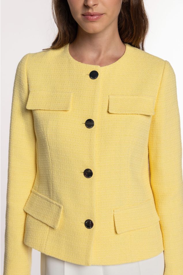 Casaco de tweed com bolsillos de tapeta
