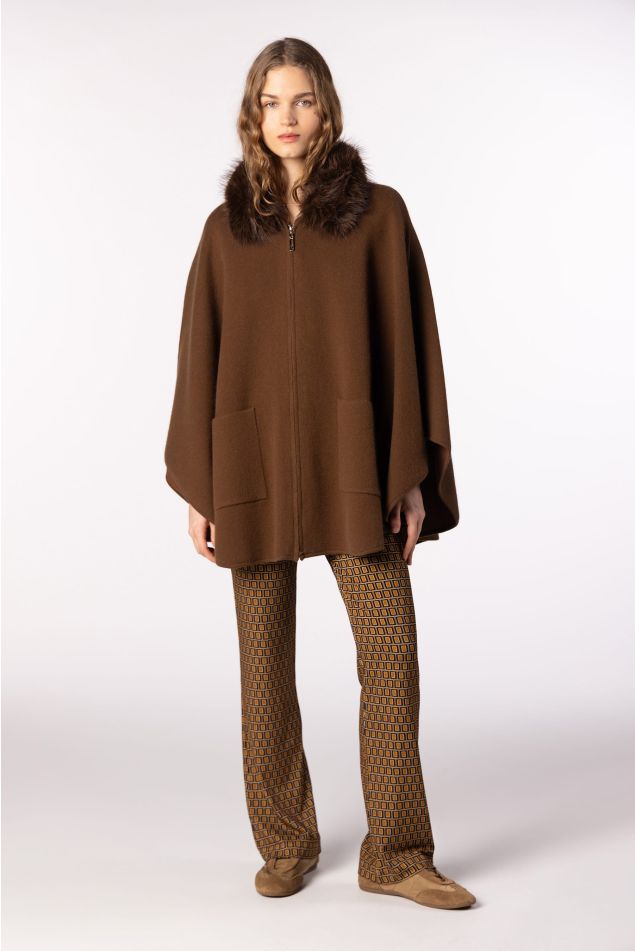 Knit cape with natural raccoon fur collar