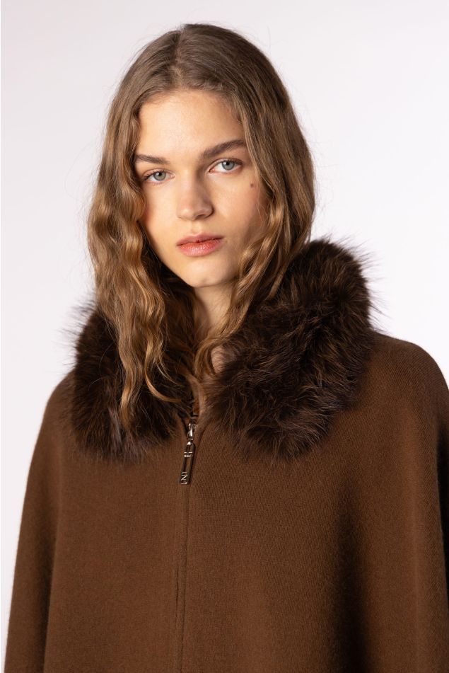 Knit cape with natural raccoon fur collar