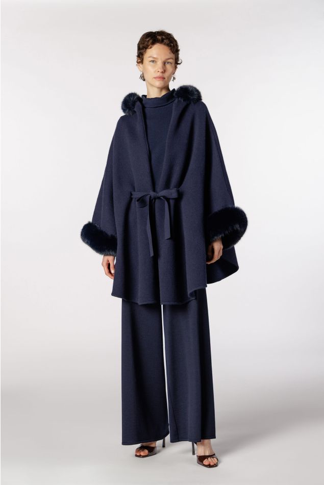 Cape-style knit coat with faux fur collar