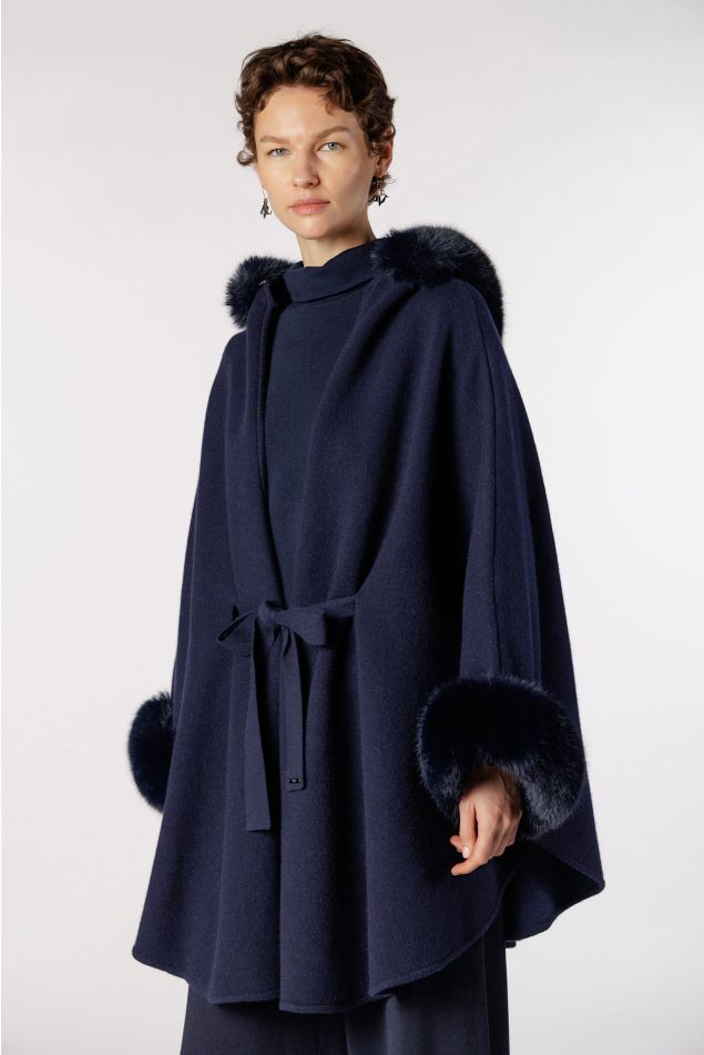Cape-style knit coat with faux fur collar