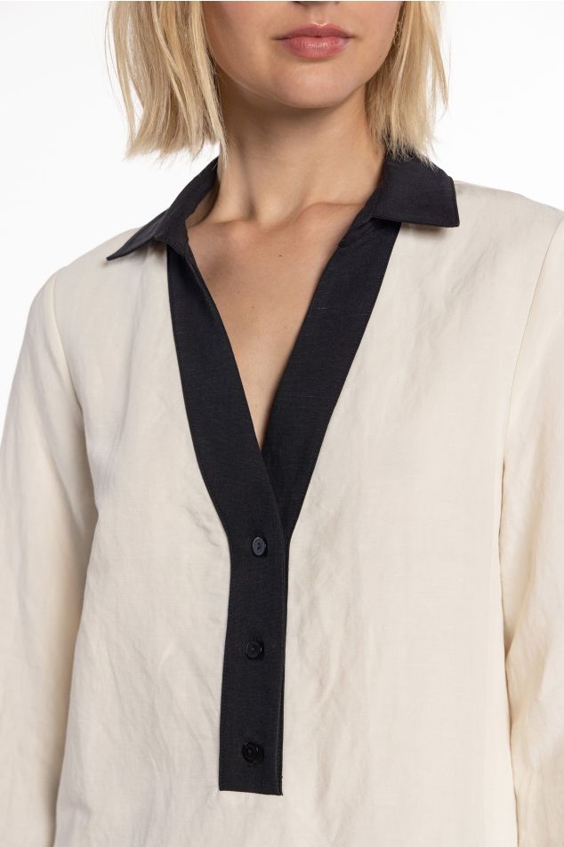 Brusa bicolor amb coll de camisa