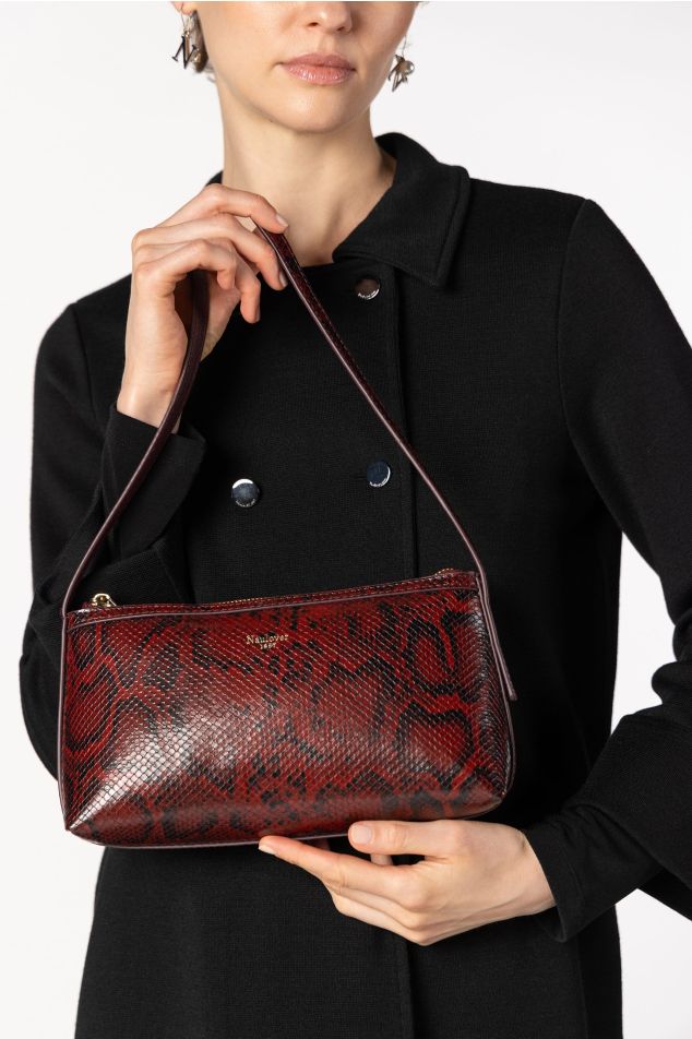 Small triangular baguette bag in python-effect vegan leather