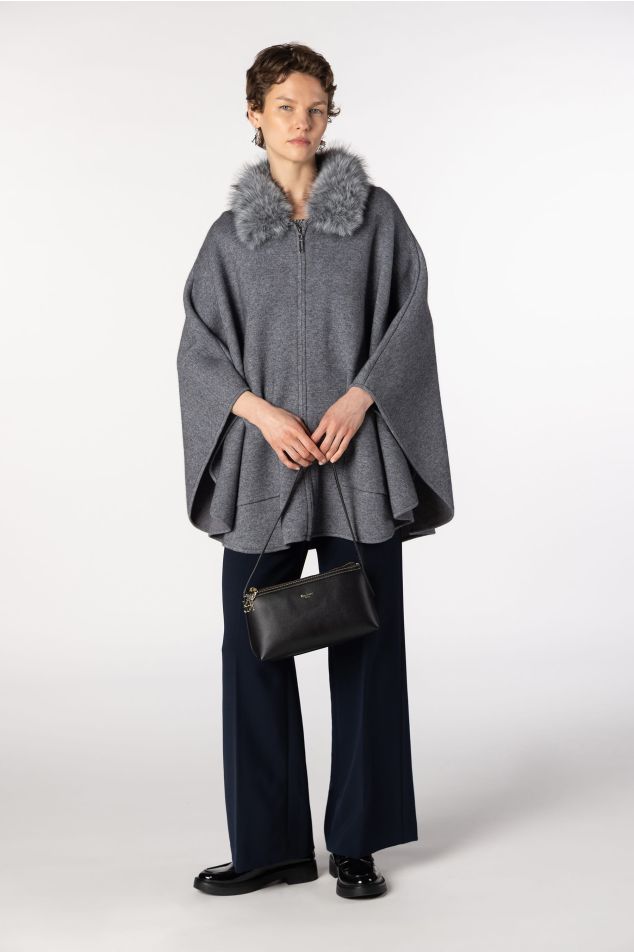 Knit cape with natural raccoon fur collar